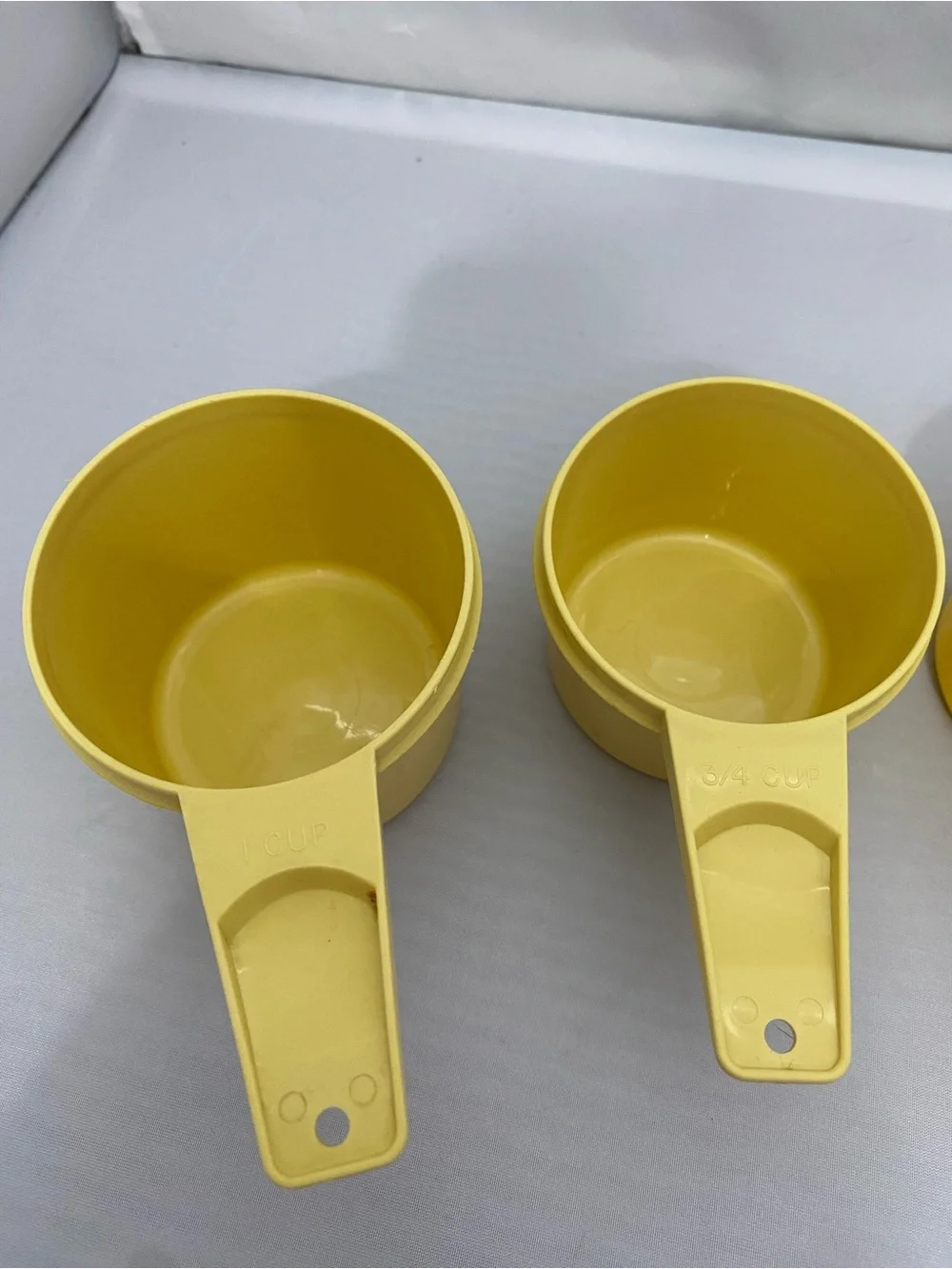 Yellow Plastic Measuring Cups